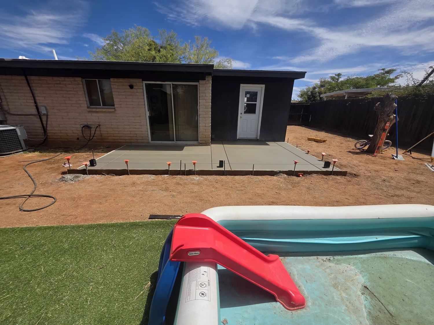 Fresh concrete patio slab, formed and poured