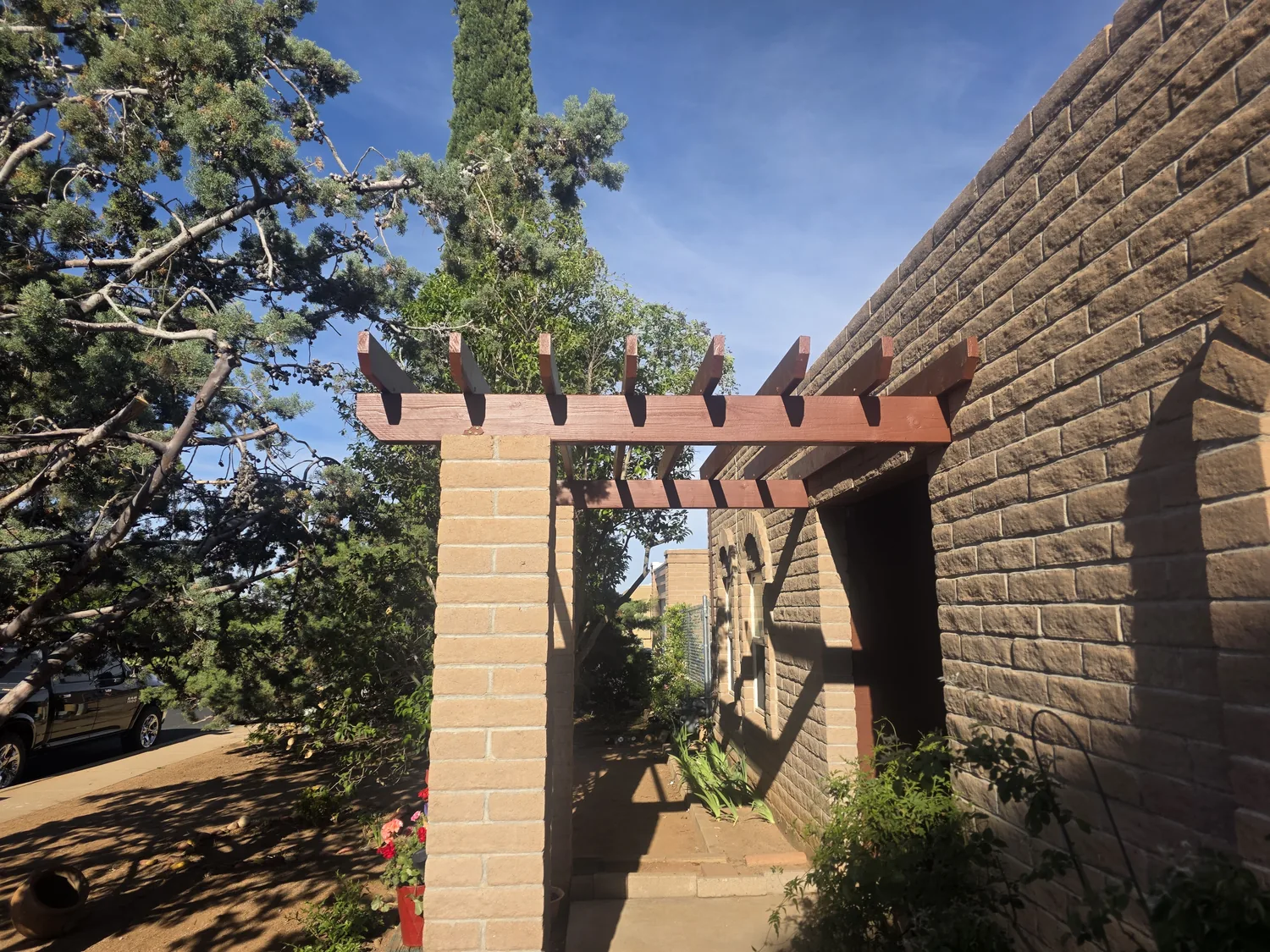Custom pergola on a masonry column